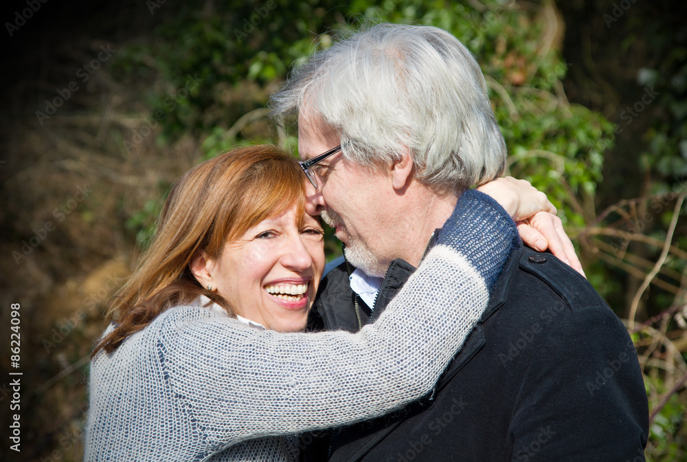Happy elderly seniors couple in park Happy elderly seniors couple in park