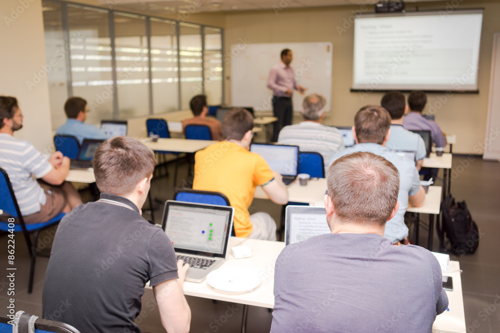Fototapeta premium rear view of the students in computer class