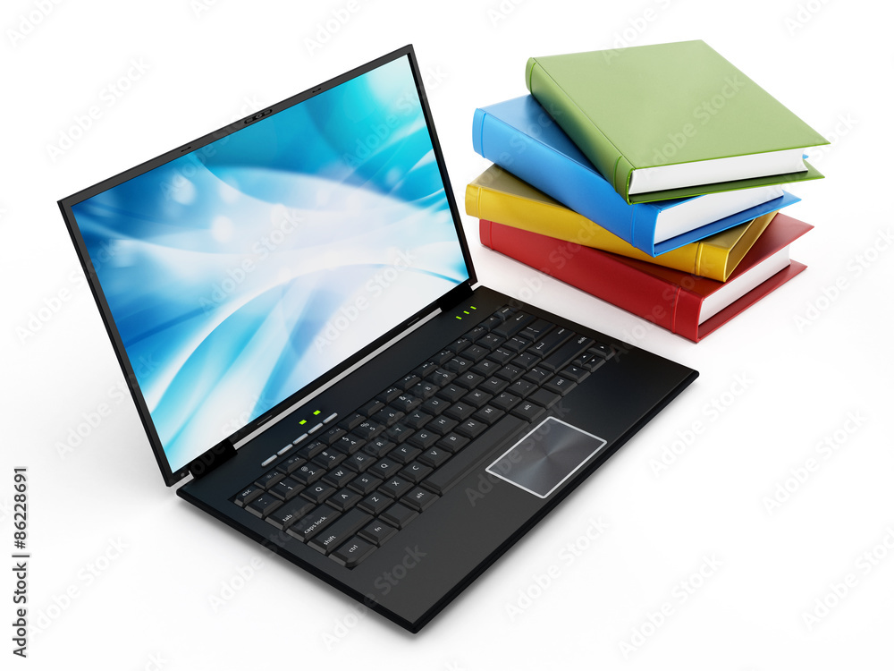Book stack on laptop computer Book stack on laptop computer
