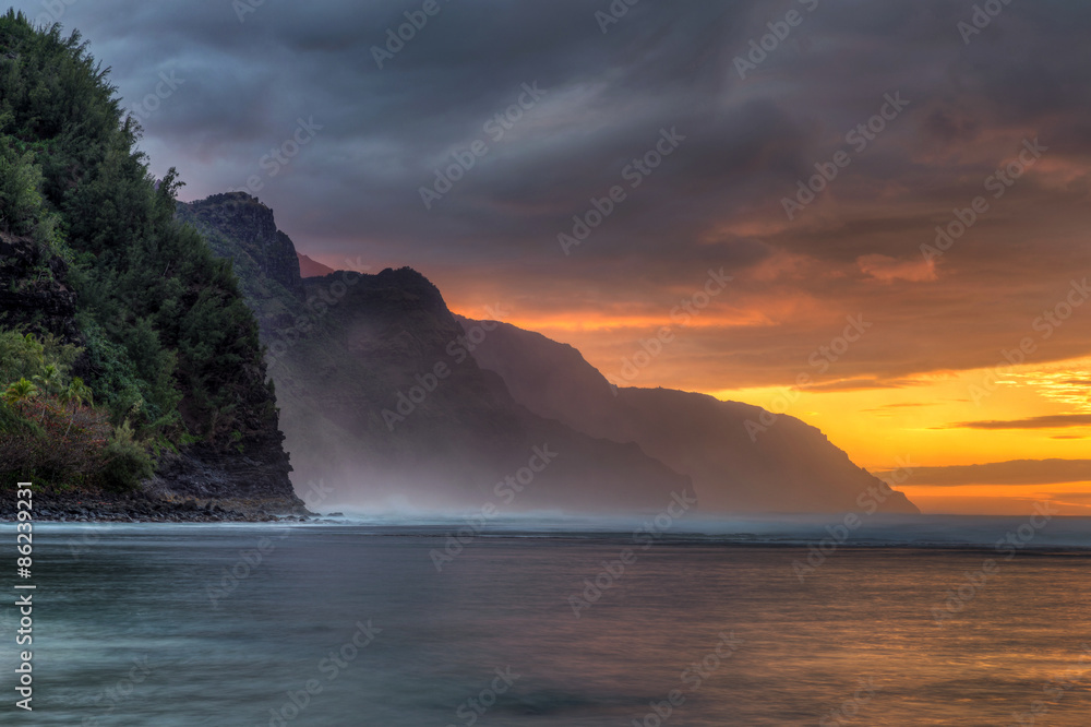 Long exposure at Sunset from Kee Beach on the Hawaiian Island of Kauai with a view of the rugged Napali coast
