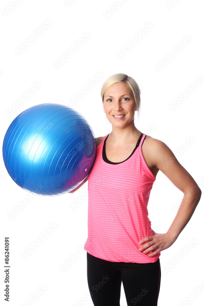 Attractive blonde woman working out in a pink shirt Attractive blonde woman working out in a pink shirt