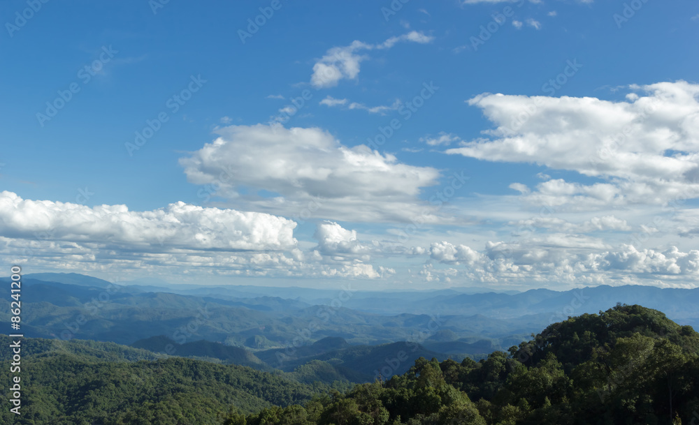 Blue mountain with blue sky and clouds background Blue mountain with blue sky and clouds background