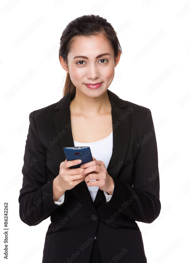 Businesswoman use of the cellphone Businesswoman use of the cellphone