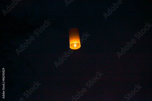 Floating lanterns in the evening sky
