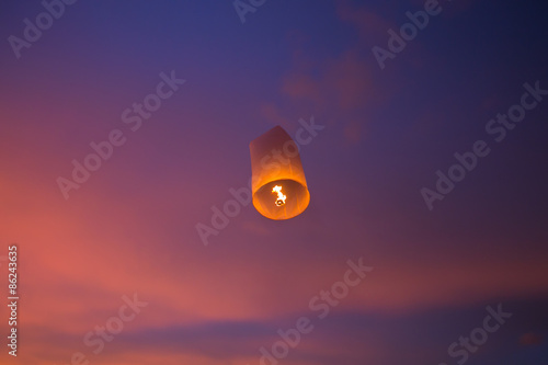 Floating lanterns in the evening sky