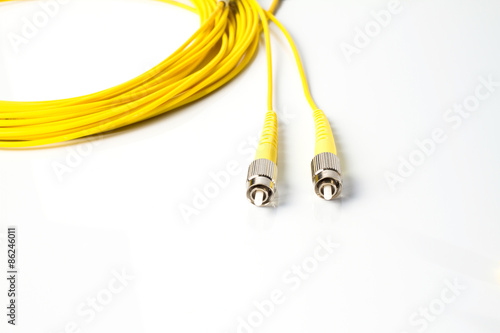 Close up of a fiber optic patchcord on white background