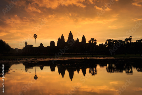 Ancient temple Angkor Wat from across the lake. The largest religious monument in the world. Siem Reap, Cambodia © Getty Gallery