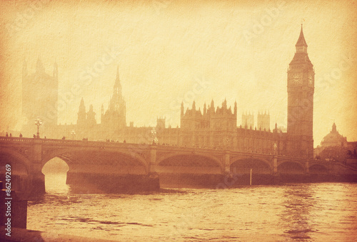 Obraz na płótnie Buildings of Parliament with Big Ban tower in London, UK. Photo in retro style. Added paper texture. Toned image w salonie