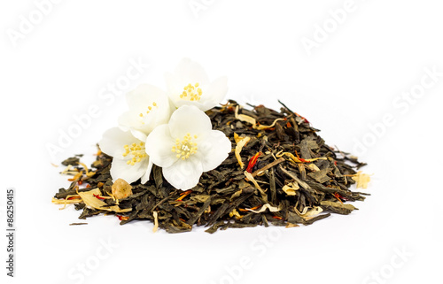 bunch of green tea leaves with jasmine. On a white background.