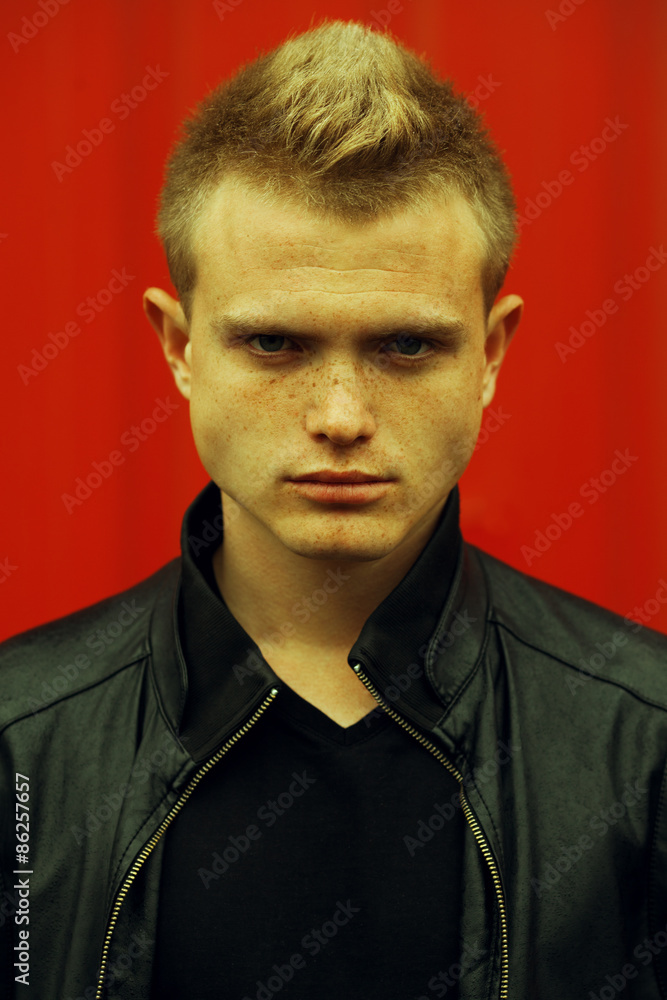 Stylish bully concept. Portrait of brutal young man Stylish bully concept. Portrait of brutal young man