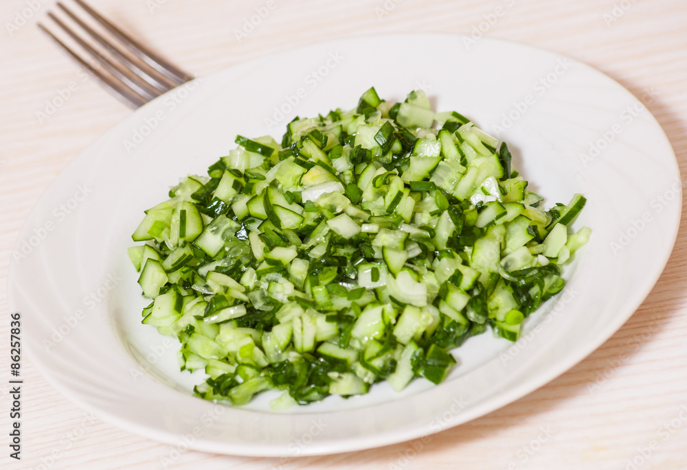 Green vegetable salad of cucumbers, spring onion Green vegetable salad of cucumbers, spring onion