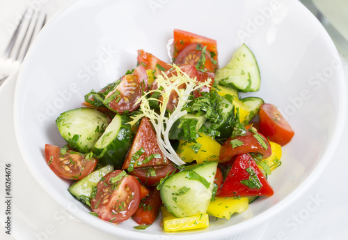 vegetable salad cucumber tomato pepper with sunflower oil