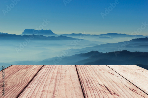 wooden floor of terrace and blue landscape