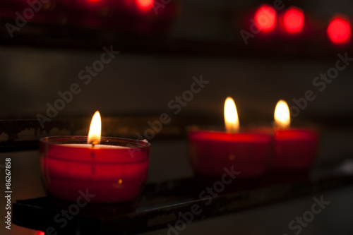 red candles in a church