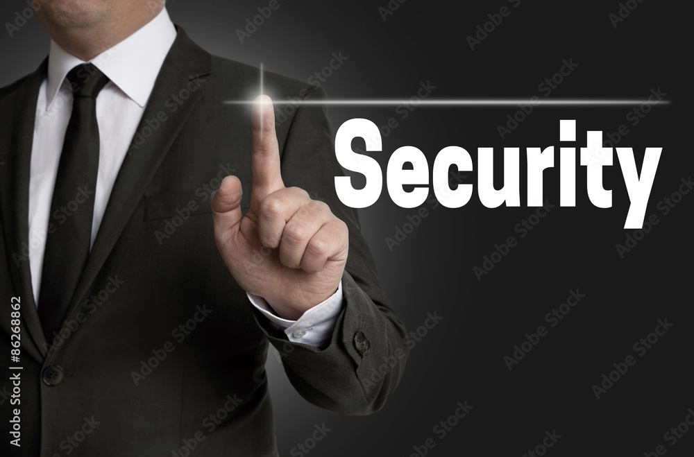 Security touchscreen is operated by businessman Security touchscreen is operated by businessman