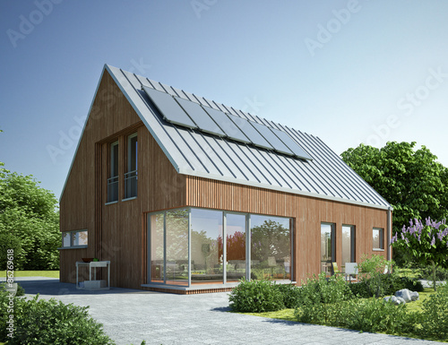Holzhaus mit Zinkblechdach photo