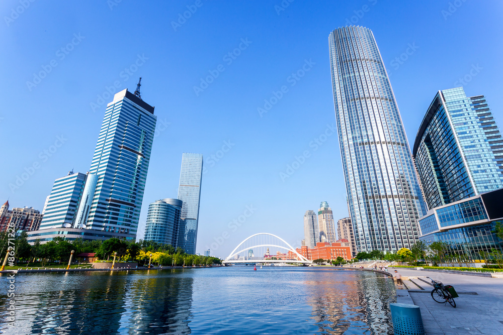 Naklejka premium Modern buildings and river in urban city