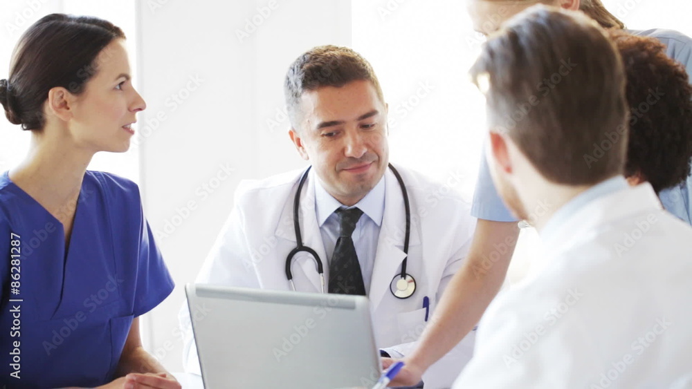 group of doctors with laptop meeting at hospital group of doctors with laptop meeting at hospital