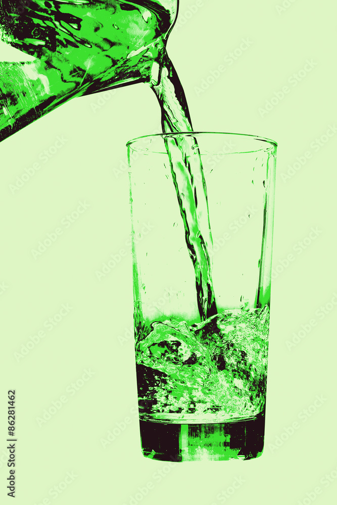 Jug pouring to glass on green background. Jug pouring to glass on green background.