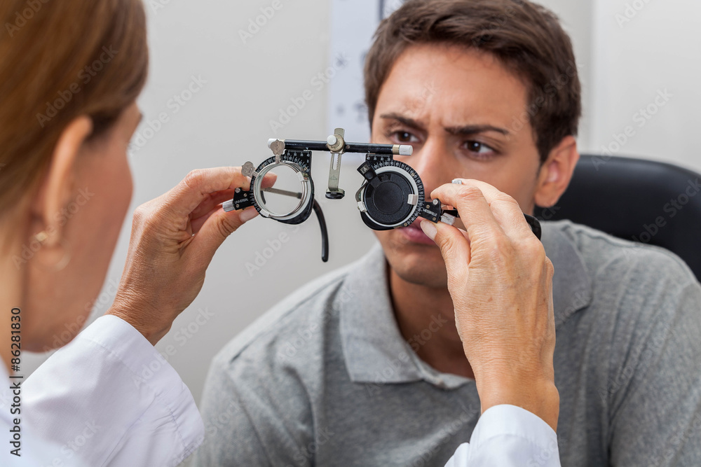 Doctor showing special lenses