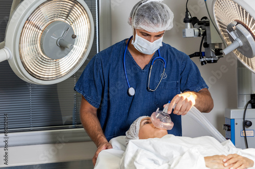 Doctor putting anesthesia