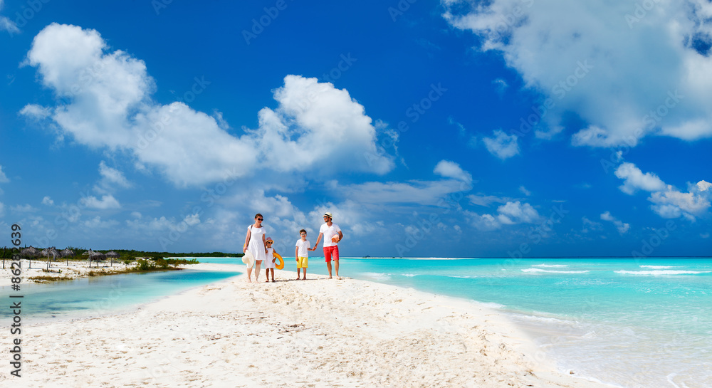 Family on a tropical beach vacation