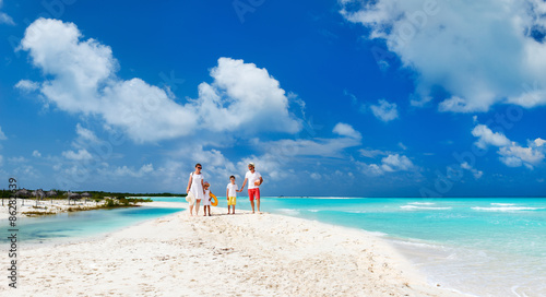 Family on a tropical beach vacation