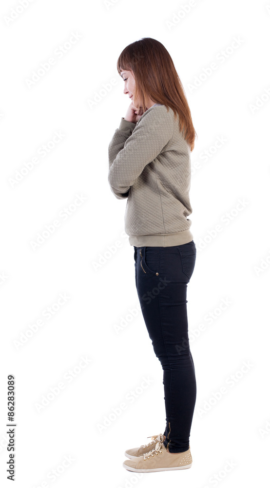 back view of standing young beautiful woman. back view of standing young beautiful woman.