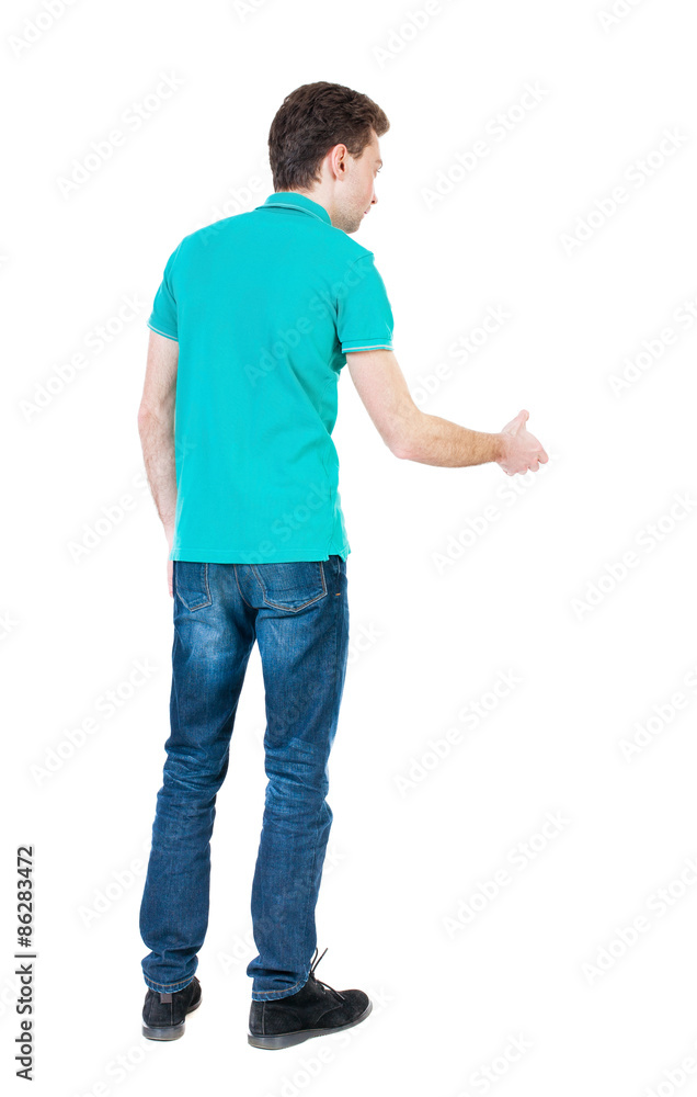 Back side view of man in shirt handshake. Back side view of man in shirt handshake.
