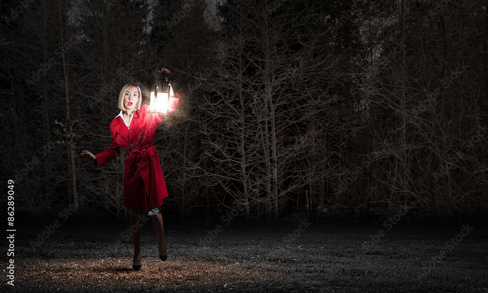 Fototapeta premium Woman with lantern