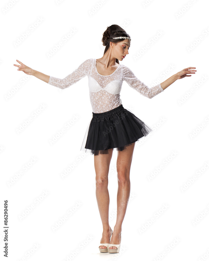 Portrait of a beautiful slim model in black skirt and white blou Portrait of a beautiful slim model in black skirt and white blou
