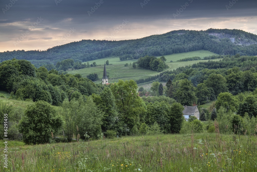 rural landscape with small church - hdr