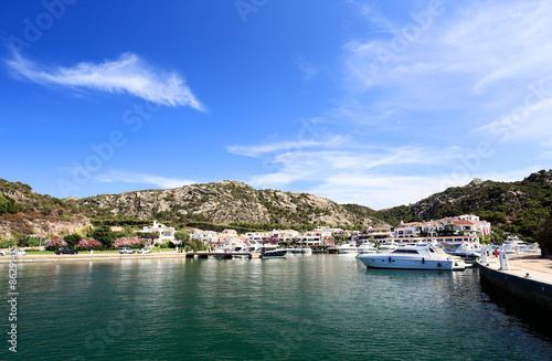 Beautiful small Sardinian port Poltu Quatu and mountains
