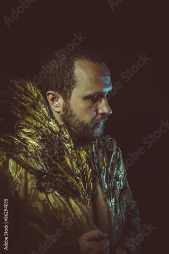 jacket attractive man with golden feathers