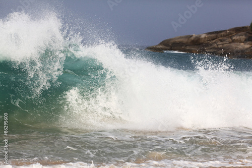 sea wave coast surf foam blue background
