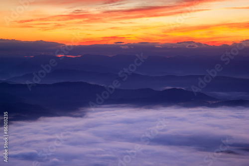 Layer of mountains in the mist at sunrise time © Southtownboy Studio