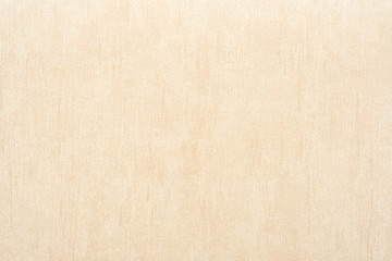 Vertical rough texture of vinyl wallpaper for abstract backgrounds of beige color