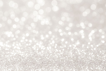 silver and white bokeh lights defocused. abstract background