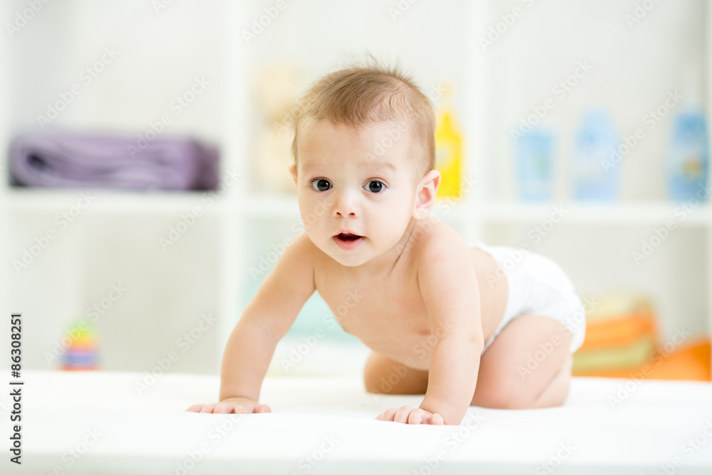 Cute smiling baby in diaper or nappy Cute smiling baby in diaper or nappy