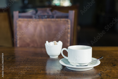 Cup of tea on table in dining room