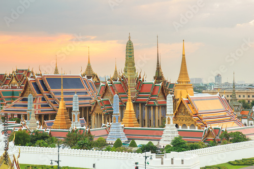 The beauty of the Emerald Buddha Temple at twilight. And while the gold of the temple catching the light. This is an important buddhist temple of thailand and a famous tourist destination. © Southtownboy Studio