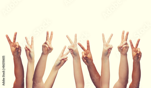 human hands showing v-sign