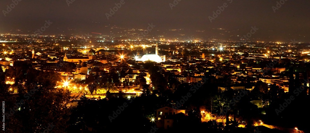 city lights at night and the illuminated monuments