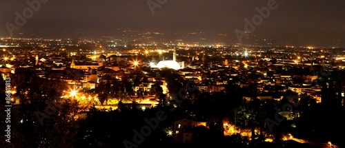 city lights at night and the illuminated monuments