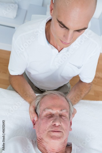 Man receiving neck massage 