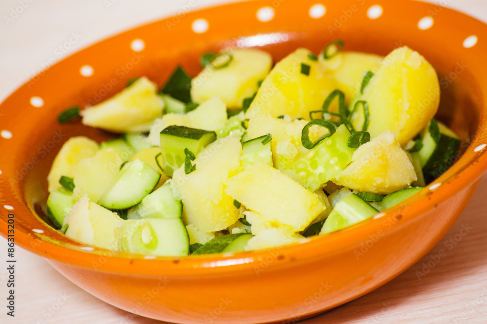 Potato salad with green onions and cucumber