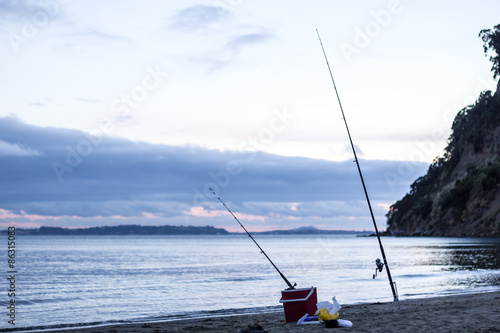 Surfcasting fishing rods and sunset