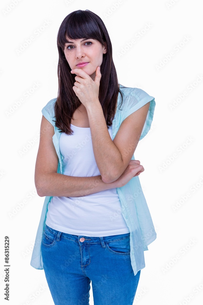 Pretty brunette with head on hand looking at camera Pretty brunette with head on hand looking at camera