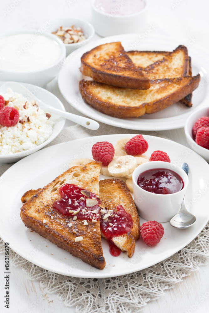 sweet breakfast - crispy toasts with fresh raspberries, banana 