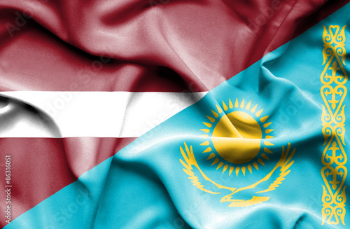 Waving flag of Kazakhstan and Latvia photo